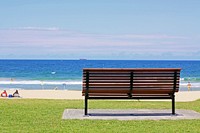 Park bench by the sea. Free public domain CC0 photo.