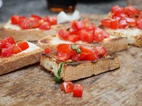 Closeup on Bruschetta with tomatoes. Free public domain CC0 image. 