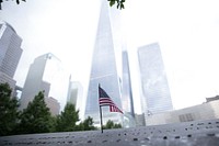 Free American flag in cityscape image, public domain CC0 photo.