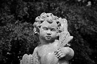 Cherubim statue. Free public domain CC0 photo.