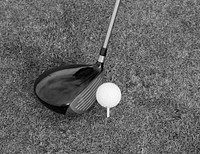 Closeup on golf club head and ball in grass. Free public domain CC0 image.