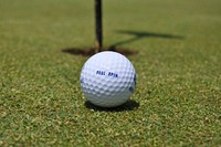 Ball on golf court photo. Free public domain CC0 image.