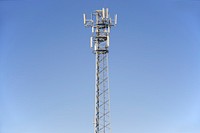 Telecommunications tower with antennas. Free public domain CC0 photo.