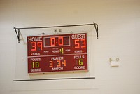 Scoreboard on wall. Free public domain CC0 photo.