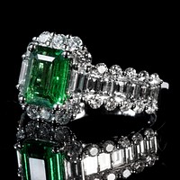 Green emerald diamond set ring. Free public domain CC0 photo.