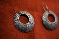 Silver earrings. Free public domain CC0 photo.