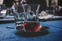 Free red liquor in glass photo, public domain beverage CC0 image.