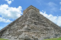 Low angle view of Mayan pyramid with blue sky in Mexico. Free public domain CC0 photo.