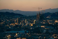 View of city of Barcelona with sunset sky. Free public domain CC0 photo.