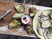 Free fresh oyster shucking image, public domain seafood CC0 photo.