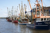 Fishing boat at dock. Free public domain CC0 photo.