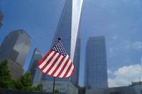 American flag, city building. Free public domain CC0 photo.