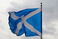 Scotland flag against blue sky. Free public domain CC0 photo