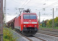 Moving train on a track. Free public domain CC0 photo.