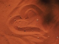 Heart on sand. Free public domain CC0 photo.
