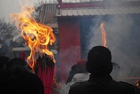 Incense ceremony in temple. Free public domain CC0 image.