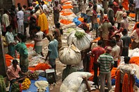 People in Kolkata flower market. Free public domain CC0 image.