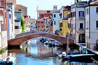 Chioggia Bridge channel in Italy. Free public domain CC0 image.