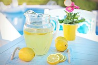 Free lemonade pitcher, summer, pool side photo, public domain beverage CC0 image.