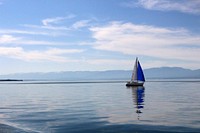 Sailing on laser class sailboat. Free public domain CC0 photo.