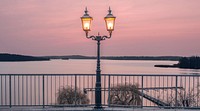 Beautiful pink sky over water. Free public domain CC0 image.