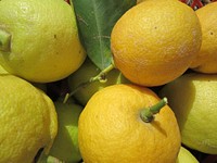 Closeup on pile of yellow lemons. Free public domain CC0 image.