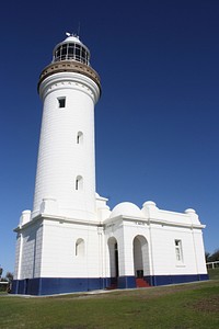 Cape Byron Lighthouse with blue sky. Free public domain CC0 photo.