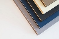 Close up of book edges on white background. Free public domain CC0 photo.