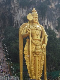 Murugan statue in Batu cave. Free public domain CC0 photo.