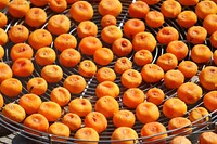 Closeup on dried persimmon fruit. Free public domain CC0 image.