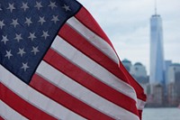 American flag, blue sky. Free public domain CC0 photo.