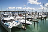 Yacht docking by the marina. Free public domain CC0 photo.