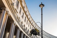 Free park crescent, London under blue sky public domain CC0 photo.