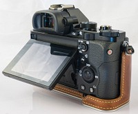 Digital camera photography equipment. Free public domain CC0 image.