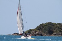 Sailing on laser class sailboat. Free public domain CC0 photo.