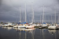 Yacht docking by the marina. Free public domain CC0 photo.