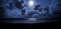 Beach with a full moon at night. Free public domain CC0 photo.