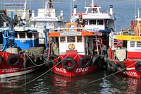 Fishing boats at dock. Free public domain CC0 photo.