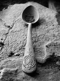 Antique spoon in black and white. Free public domain CC0 image.