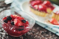 Close up berry jam in glass bowl. Free public domain CC0 photo.