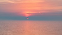 Beautiful beach sunset seascape scenery. Free public domain CC0 image.