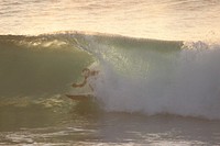 Surfers catching waves, sports photography. Free public domain CC0 image.