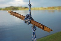 Broken swing at the lake. Free public domain CC0 image.