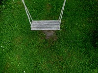 Swing in playground. Free public domain CC0 image.