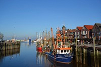 Boat docked by the port. Free public domain CC0 photo.