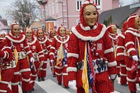 Wooden mask parade in Germany. Free public domain CC0 photo.