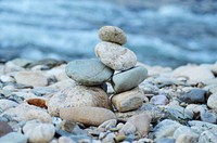 Pebble tower on the beach. Free public domain CC0 photo.