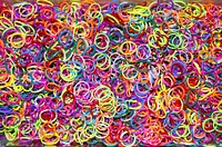 Colorful rubber bands background. Free public domain CC0 photo.