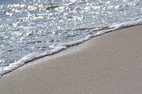 Crashing beach waves close up. Free public domain CC0 image.