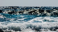 Sea waves crashing close up. Free public domain CC0 photo.